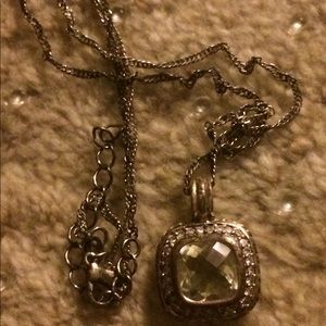 Woman long necklace.